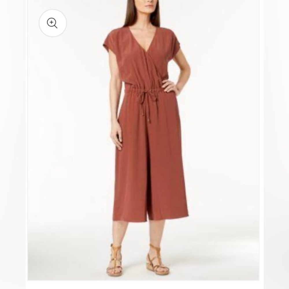 Eileen Fisher one piece romper. Size medium. Light stain at shown in picture.